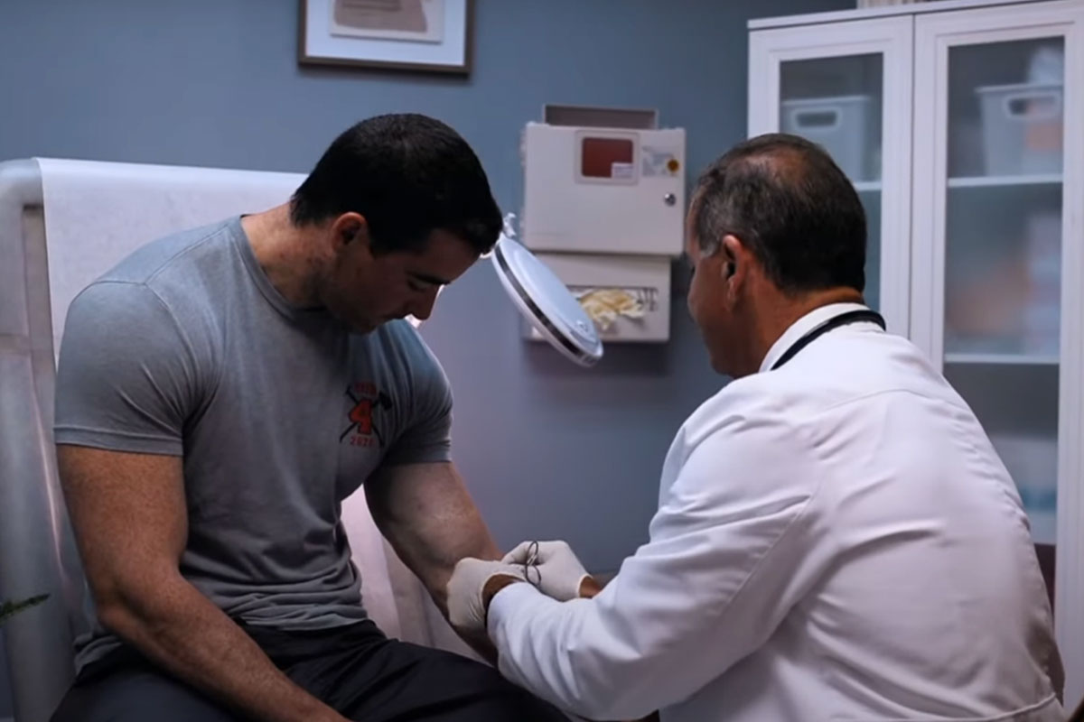 Man receiving blood work at Fountain of You MD.