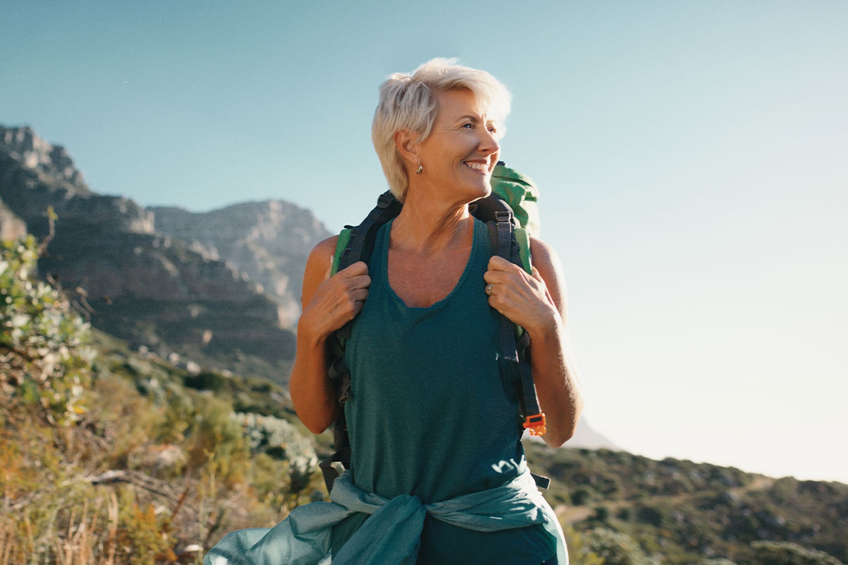 woman hiking after peptide therapy in Virginia Beach