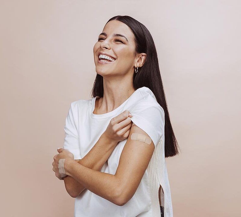 Cheerful female after receiving shot