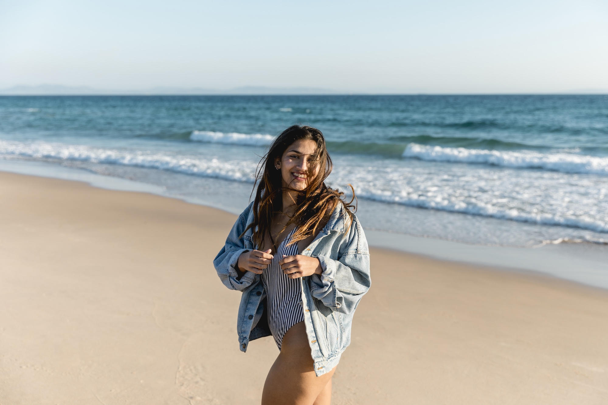 Cheerful woman on the beach