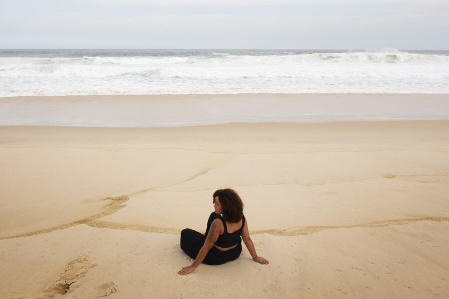 Woman thinking at the beach